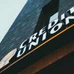 a sign on the side of a brick building